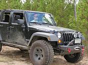 Front bumper, winch, and off-road lights